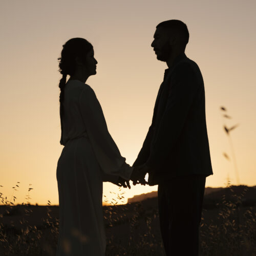 couple silhouettes nature side view