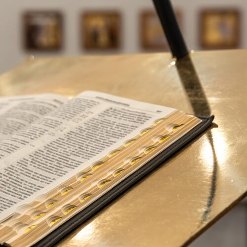 open bible church lectern soft light holy scripture